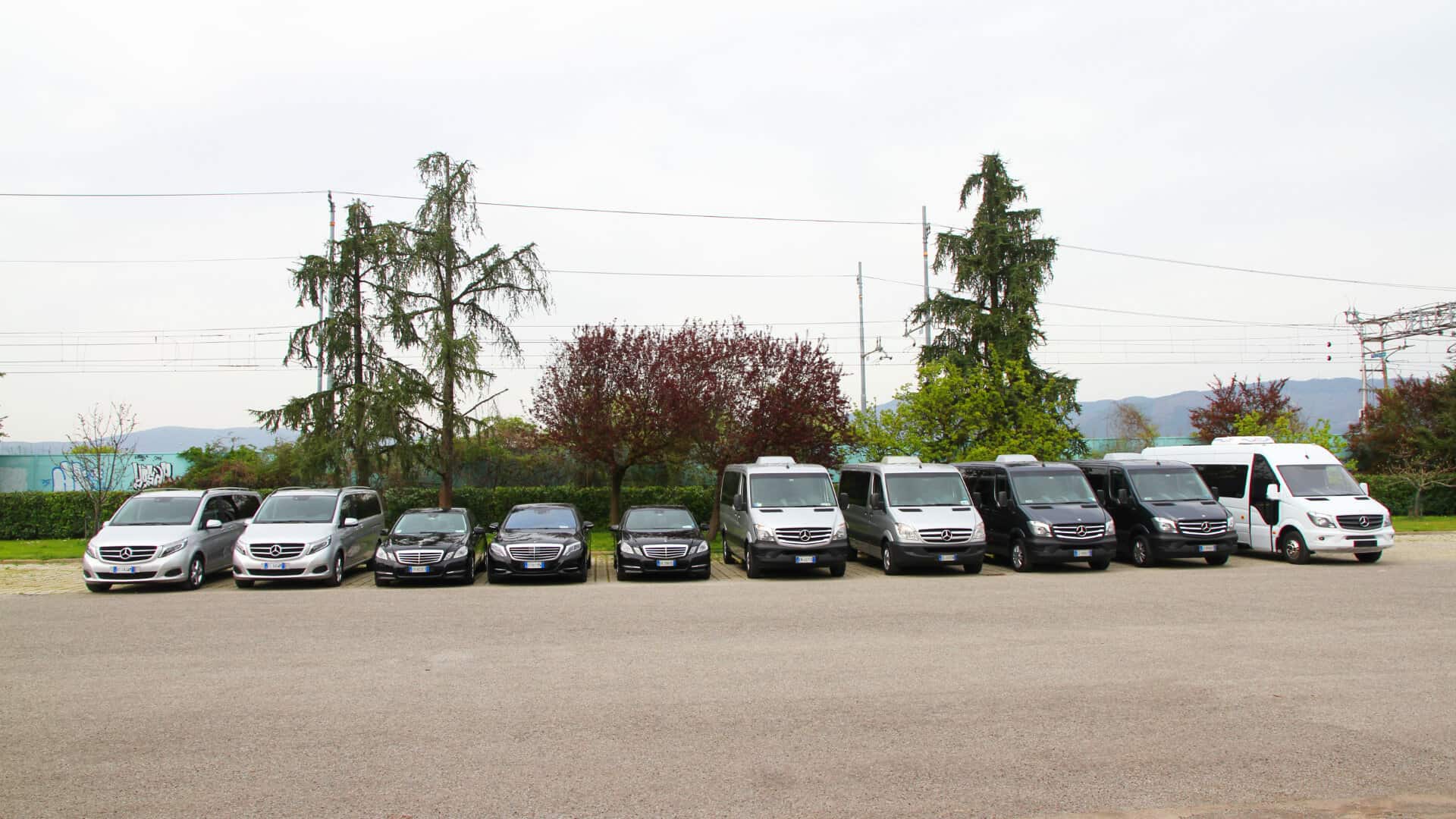 The Prestige Rent fleet lined up: Mercedes V Class, E Class, S Class, Sprinter vans and a minibus