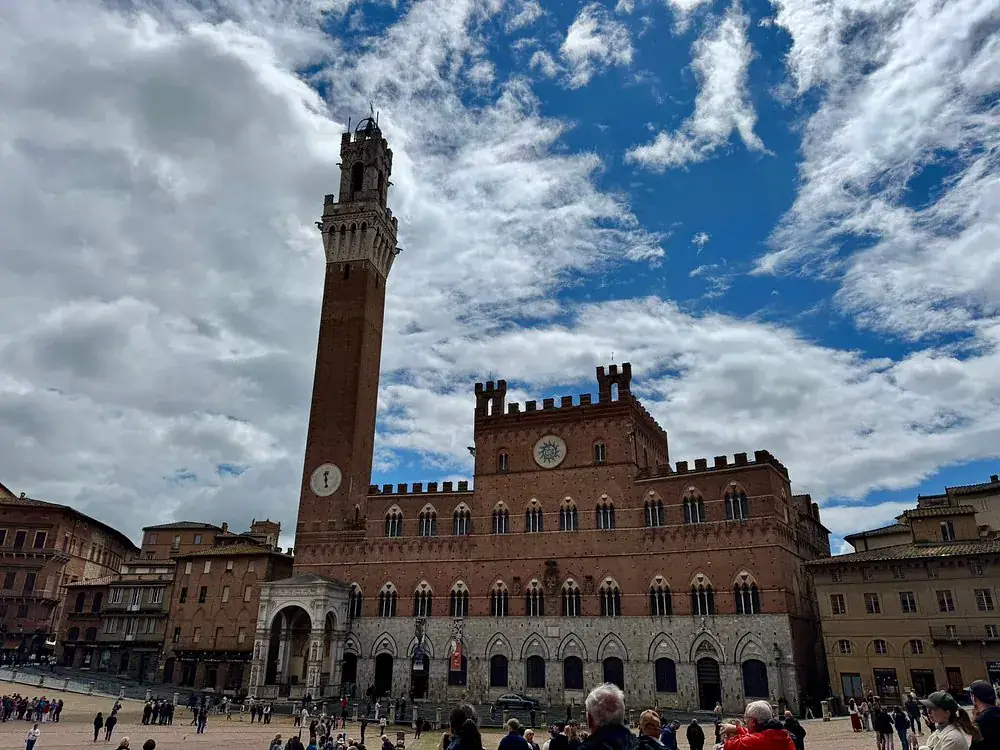 The Torre del Mangia and Palazzo Pubblico seen from Piazza del Campo