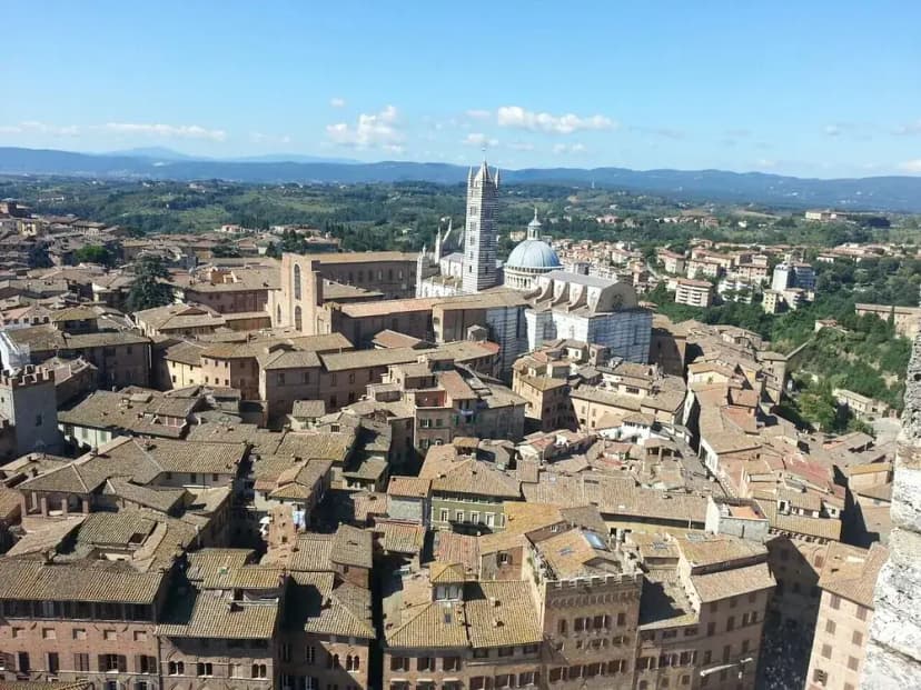 Panorama of Siena with the striped Cathedral rising above the rooftops
