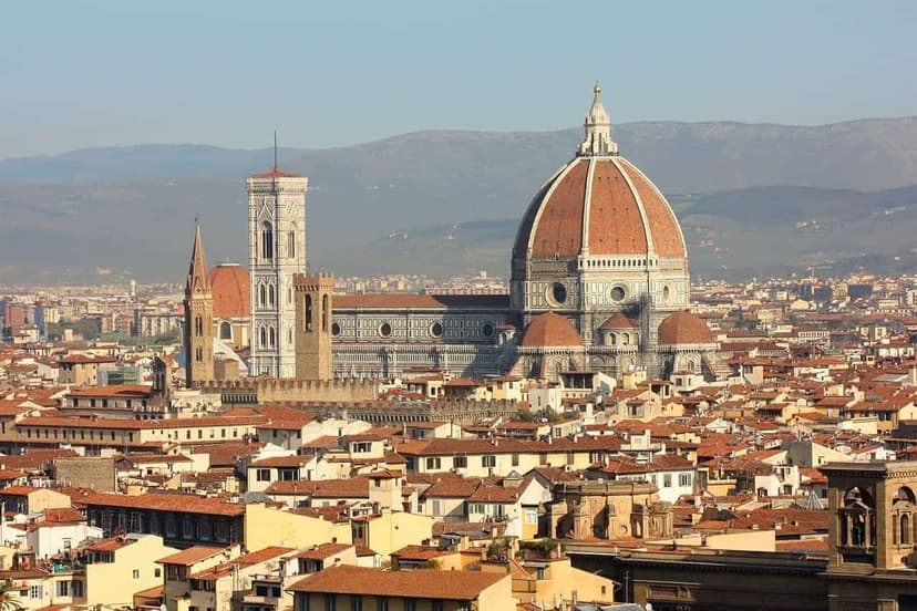 The dome of Florence over the city roofs, with the Tuscan hills behind